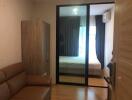 View of a bedroom through glass sliding doors