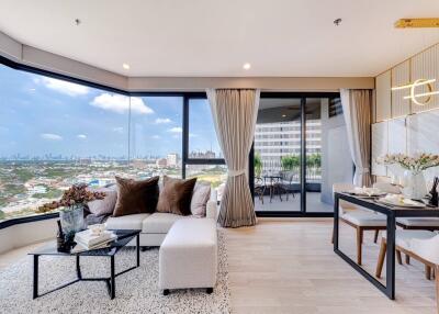 Modern living room with large windows and city view