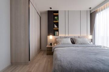 Modern bedroom with cozy decor and ample natural light