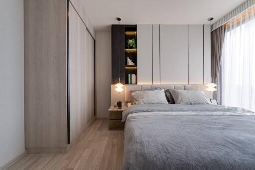 Modern bedroom with cozy decor and ample natural light