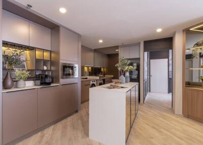 Modern kitchen with island and integrated appliances