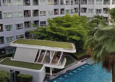 Apartment building with swimming pool and garden