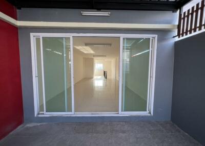 Spacious living area with large glass doors