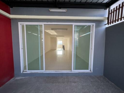 Spacious living area with large glass doors