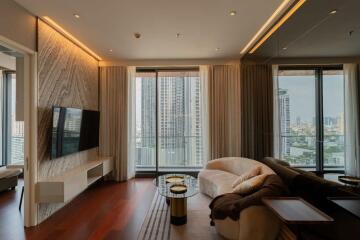 Modern living room with large windows and city view