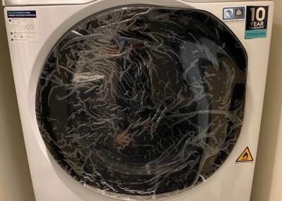 Washing machine in a laundry room