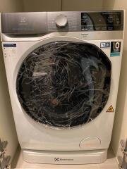 Washing machine in a laundry room