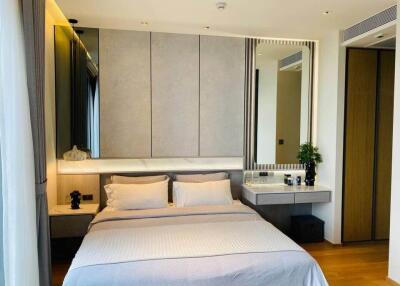 Modern bedroom with a double bed and built-in storage