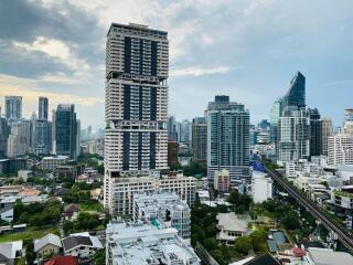 Aerial view of cityscape with residential and commercial buildings