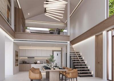 Modern open-plan living area with kitchen, dining space, and staircase leading to second floor