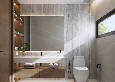 Modern bathroom with vanity, mirror, and toilet