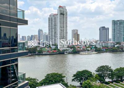 Balcony view of river with cityscape