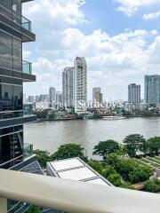 Balcony view of river with cityscape