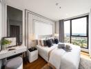 Modern bedroom with large window and city view