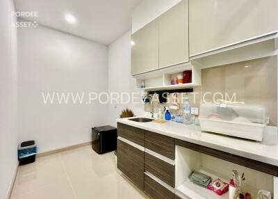 Modern kitchen with cabinets and ample counter space