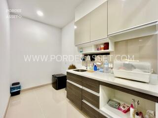 Modern kitchen with cabinets and ample counter space