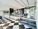 Modern atrium with checkered floor and elevated platform