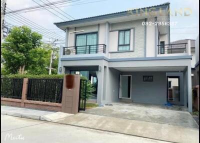 Two-story residential house with a driveway