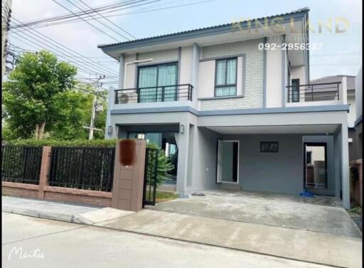 Two-story residential house with a driveway