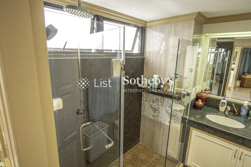 Modern bathroom with glass shower and vanity