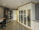 Home office with built-in bookshelf and mirrored wardrobe