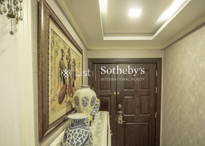 Beautifully decorated entryway with traditional artwork and ornaments