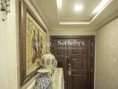 Beautifully decorated entryway with traditional artwork and ornaments