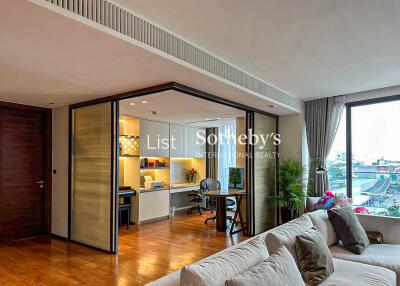 Modern living room with home office area