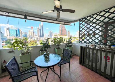 Spacious balcony with city view