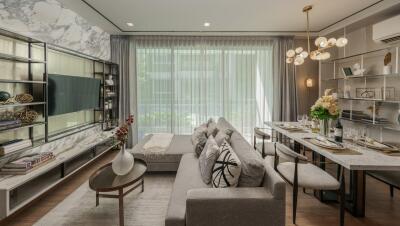 Stylish modern living room with a cozy seating area and a dining table