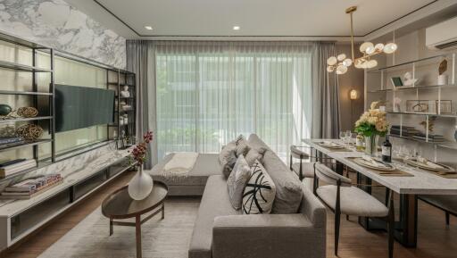 Stylish modern living room with a cozy seating area and a dining table