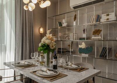 Modern dining area with bookshelf