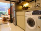 Modern kitchen with appliances and view to living area