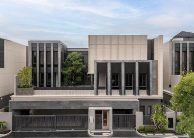 Modern building exterior with lush greenery