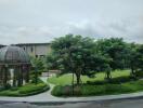 Beautiful garden view with trees and gazebo