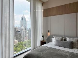 Modern bedroom with a city view