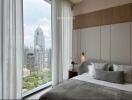 Modern bedroom with a city view