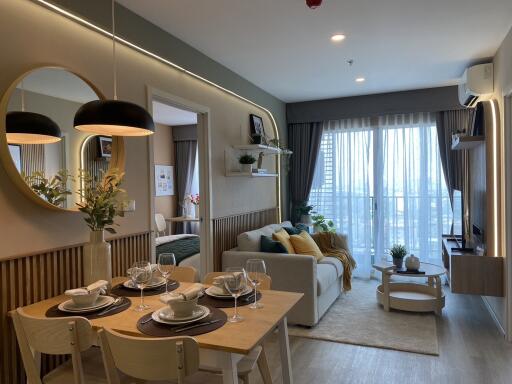 Modern living and dining area with natural light