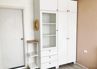 Bedroom with wardrobe and shelf