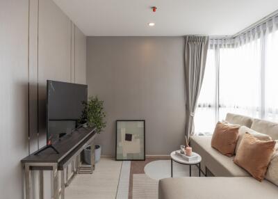 Modern living room with natural light and contemporary decor