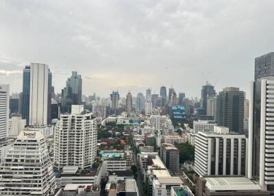 View of city skyline from building window