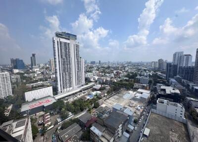 View of cityscape with high-rise buildings on a clear day