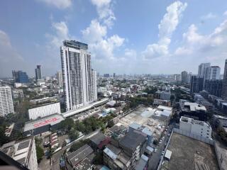 View of cityscape with high-rise buildings on a clear day