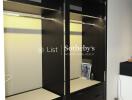 modern closet with hanging rods and shelving