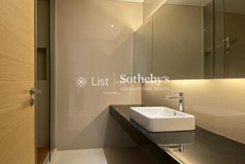 Modern bathroom with sink and large mirror