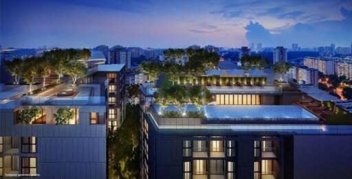 Aerial view of modern apartment buildings with rooftop gardens and swimming pool during twilight.