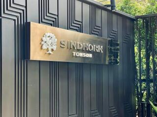 Exterior view of the Sindhorn Tonson building with signage