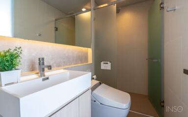 Modern bathroom with integrated sink and toilet