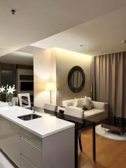 Modern living room with open kitchen