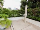 Rooftop patio with greenery